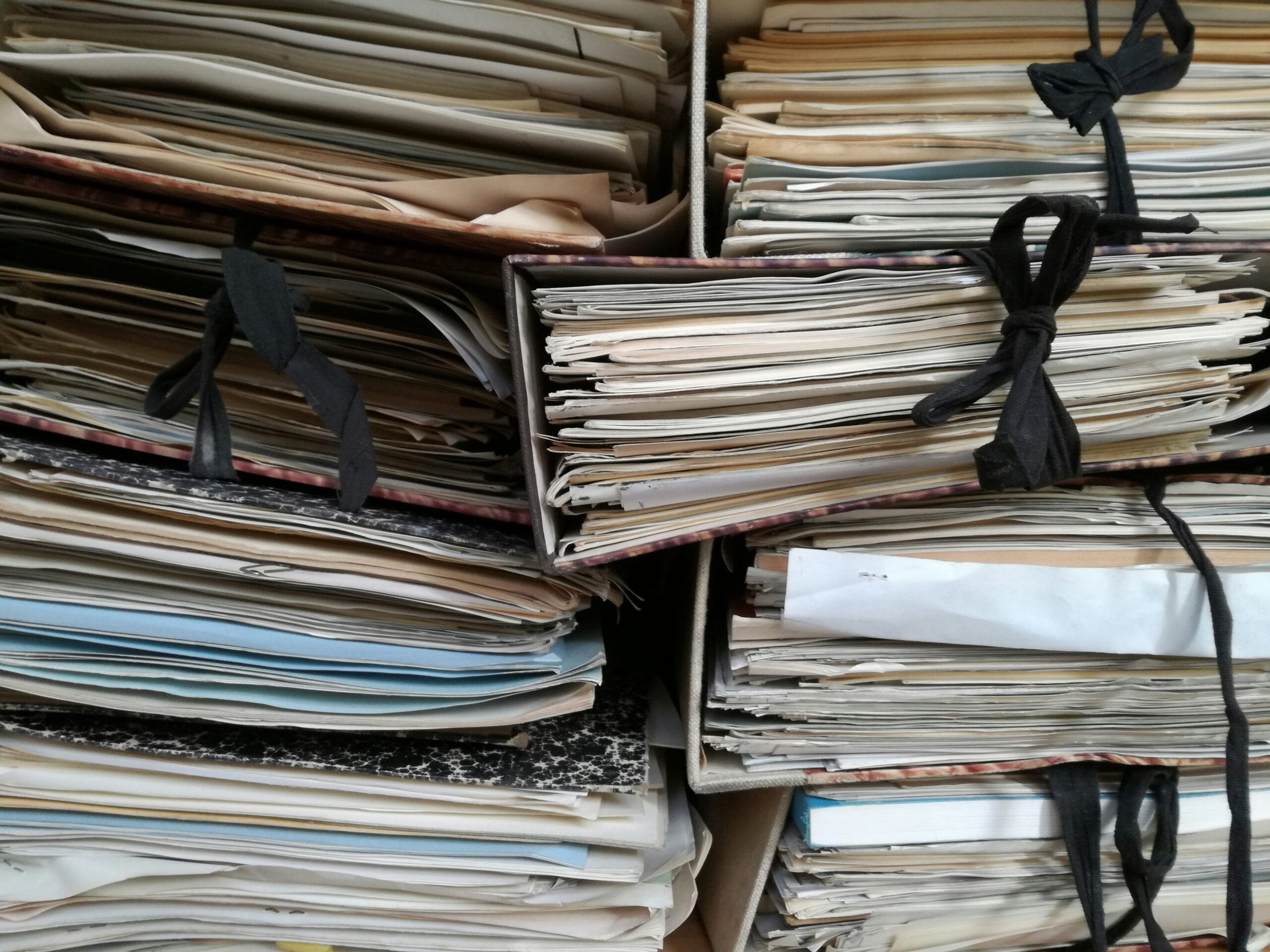 Paperwork a stack of files in a file cabinet